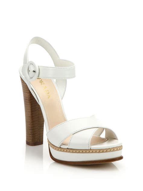 prada white platform sandals.